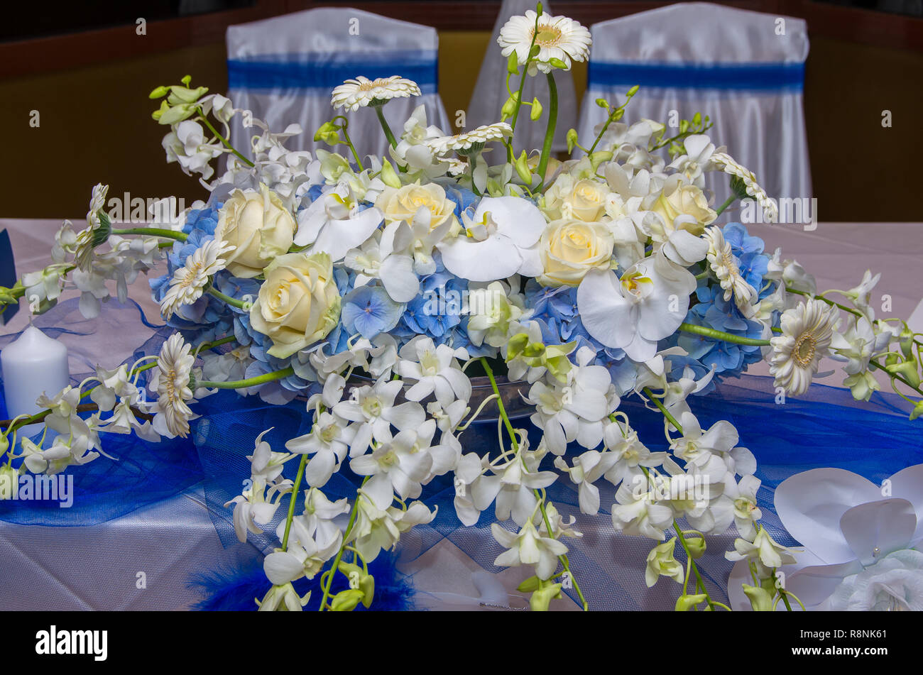 Table decoration with flowers. Stock Photo