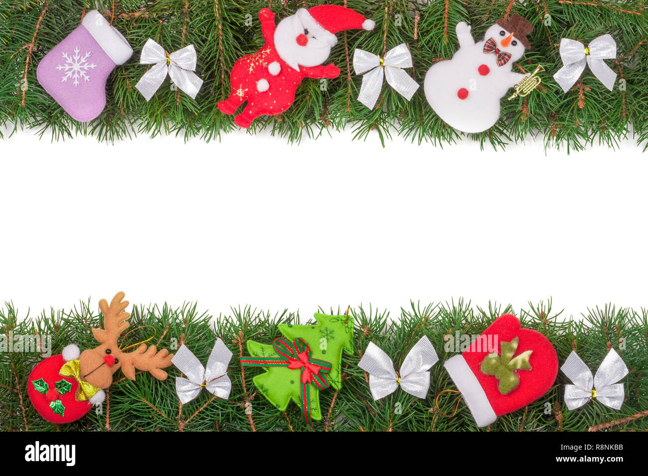 Christmas frame made of fir branches decorated with silver bows Snowman ...
