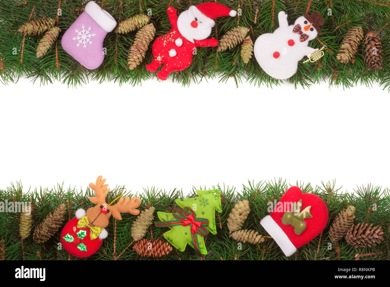 Christmas frame made of fir branches decorated with cones Snowman and ...