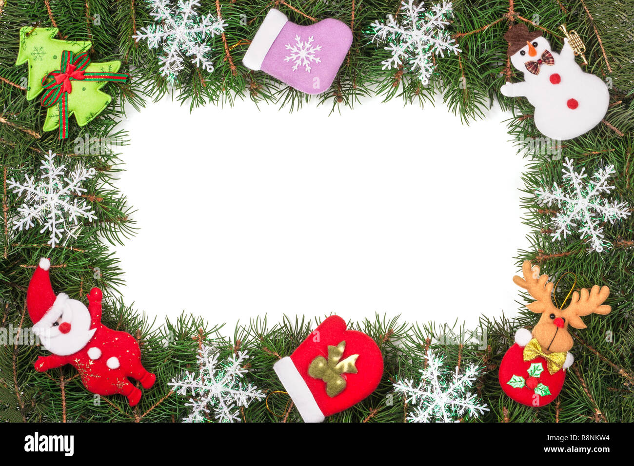 Christmas frame made of fir branches decorated with snowflakes Snowman ...