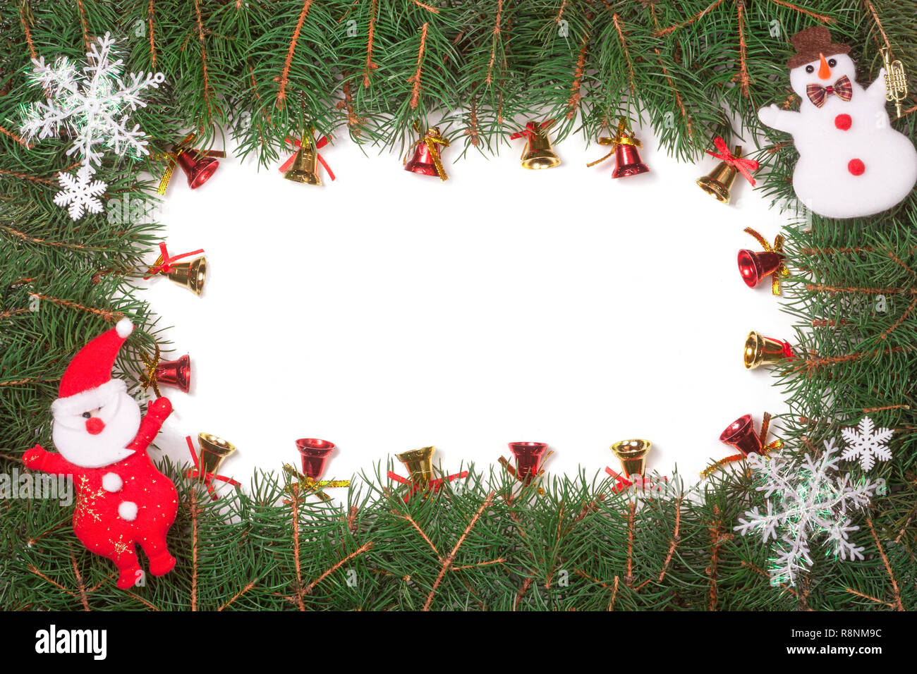 Christmas frame made of fir branches decorated with Santa Claus and ...