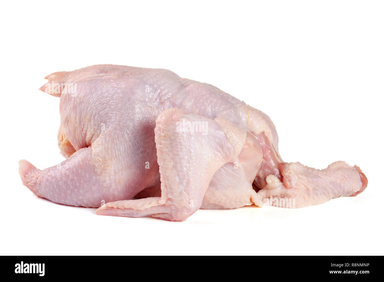 raw chicken carcass isolated on white background Stock Photo Alamy