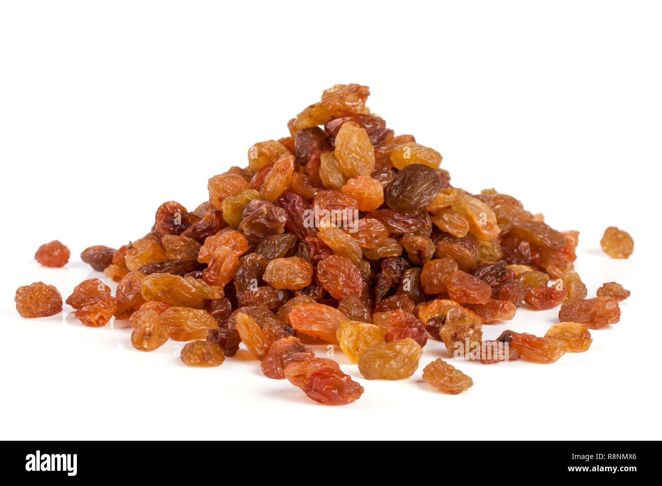 pile of raisins isolated on white background Stock Photo - Alamy