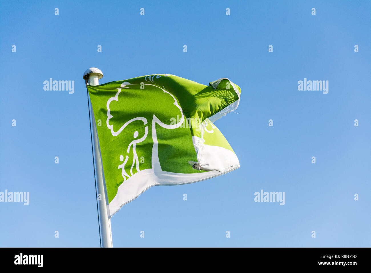 Green Flag Award blowing in the wind at the Severn Valley Country park, Alveley, Shropshire, UK. Stock Photo