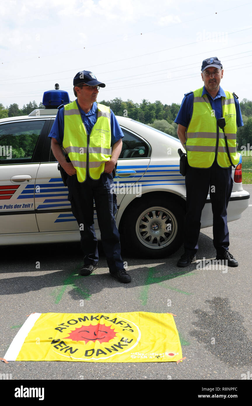 The police which is protecting the nuclear power station Beznau get a clear message from the protesters Stock Photo