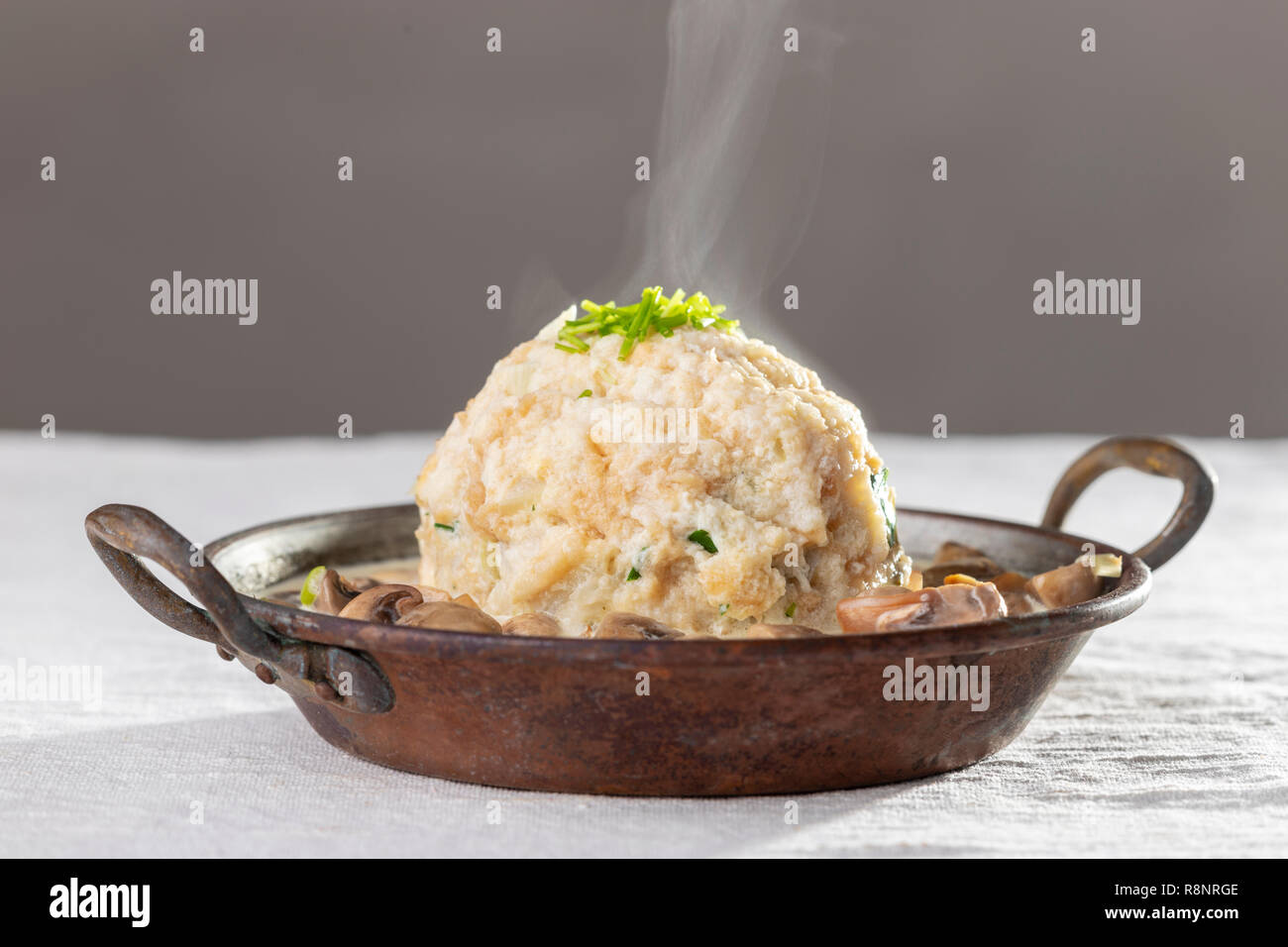 bavarian dumpling in mushroom sauce Stock Photo