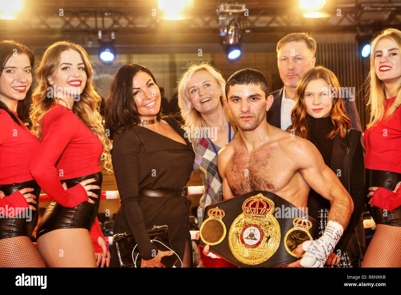 Ukraine's WBA Flyweight boxing world champion Artem Dalakian with Red Foxes cheerleaders,coach Dmitry Eliseev after successful defense against Lebron Stock Photo