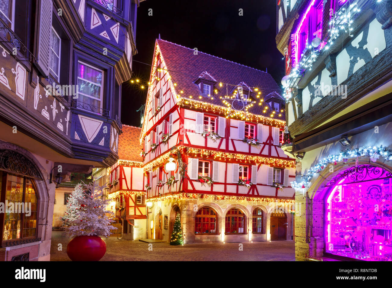 Christmas street at night in Colmar, Alsace, France Stock Photo