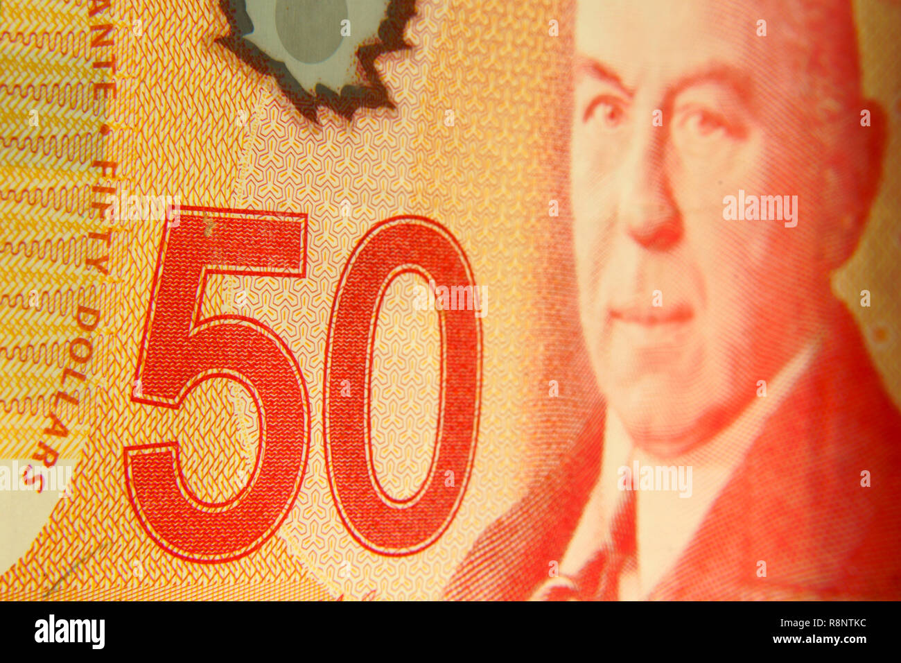Close up of a fifty canadian dollar bill with the portrait of W.L. Mackenzie King, Prime Minister of Canada from 1921 to 1930 and from 1935 to 1948. Stock Photo