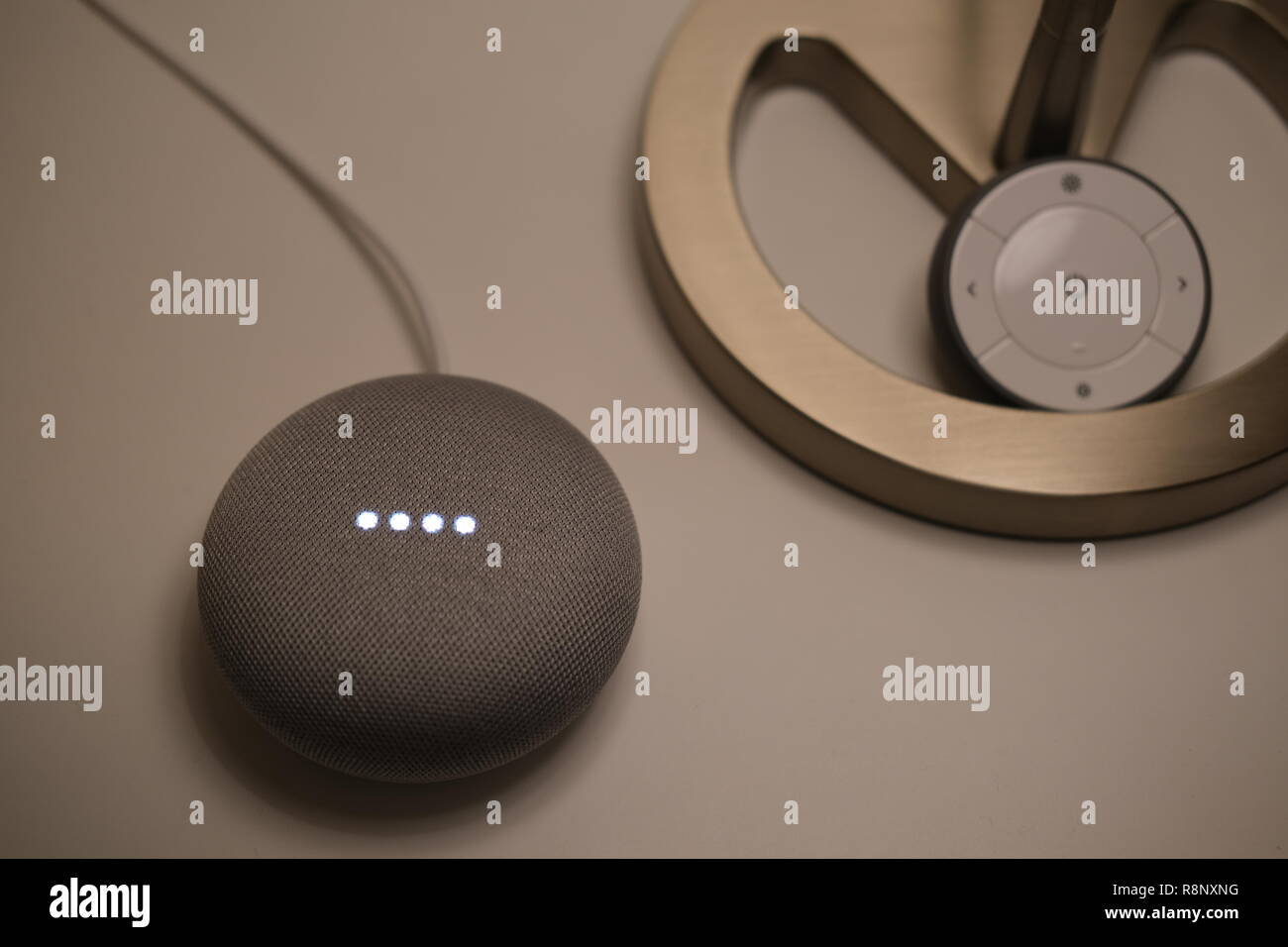 Google Home Mini with IKEA Tradfri Remote Control and IKEA Nyfors Table  Lamp Stock Photo - Alamy