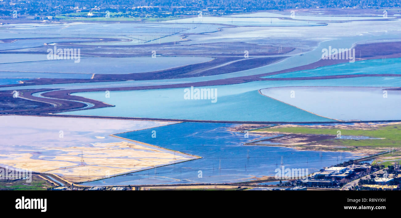 Aerial view of colorful ponds used for salt production in south San Francisco bay area; California Stock Photo