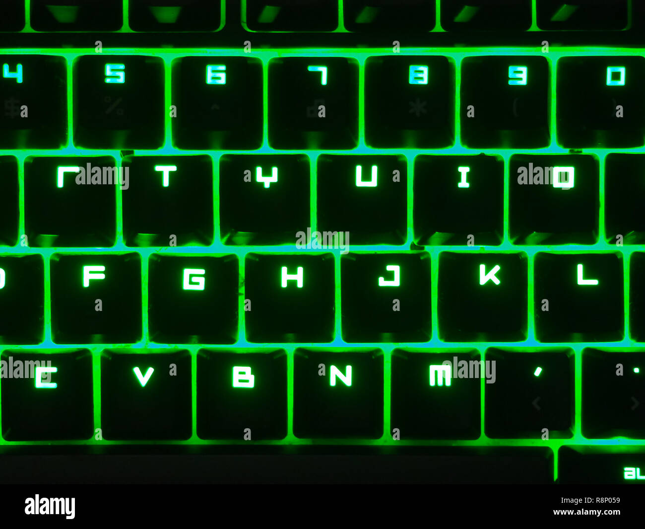 Black keyboard with green led. Colorful keyboard for gaming. Backlit  keyboard with versatile color schemes. Colorful light keyboard Stock Photo  - Alamy