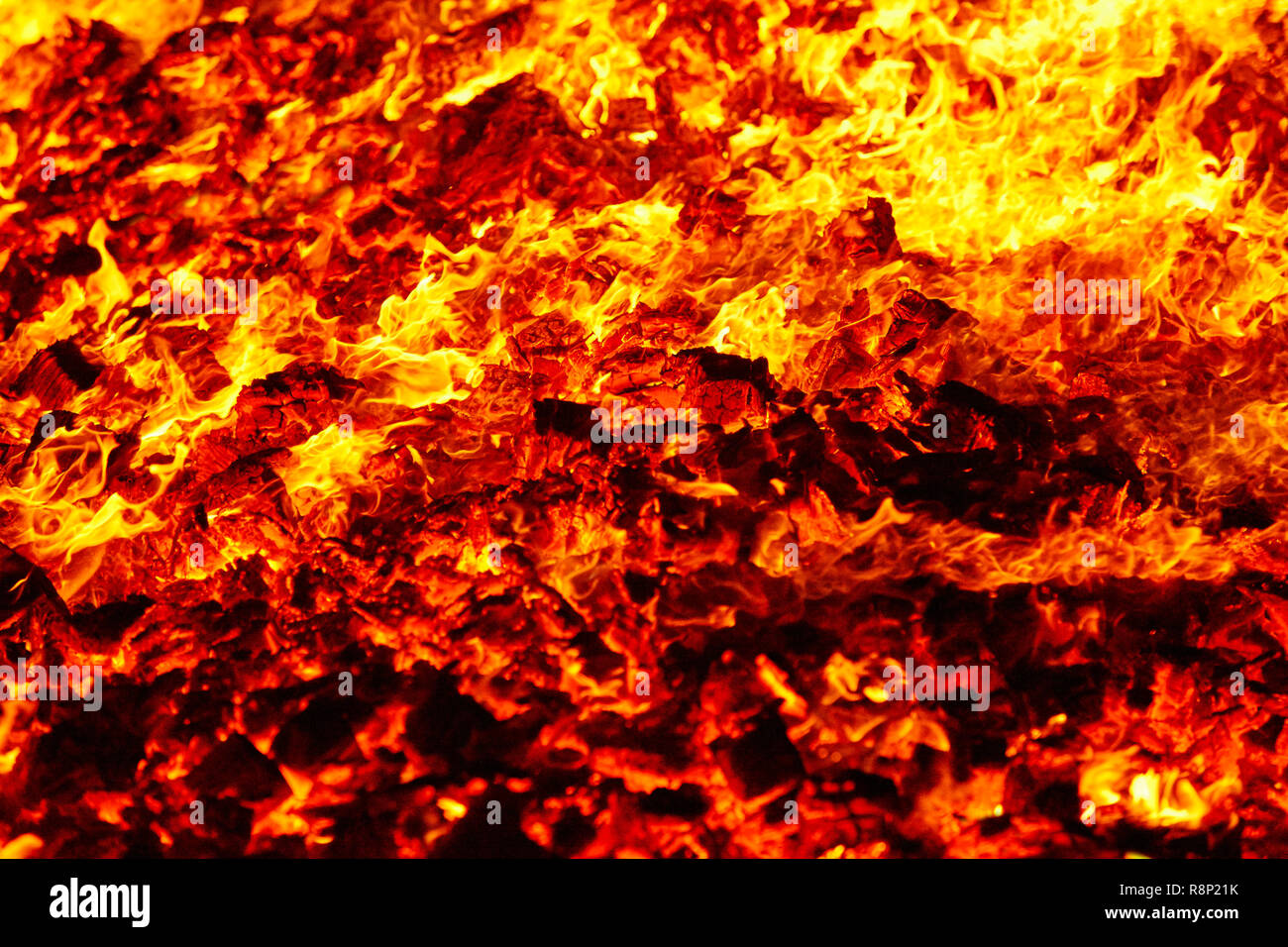 Fire. Volcano incandescent material. Hot charcoal bonfire. Carbon