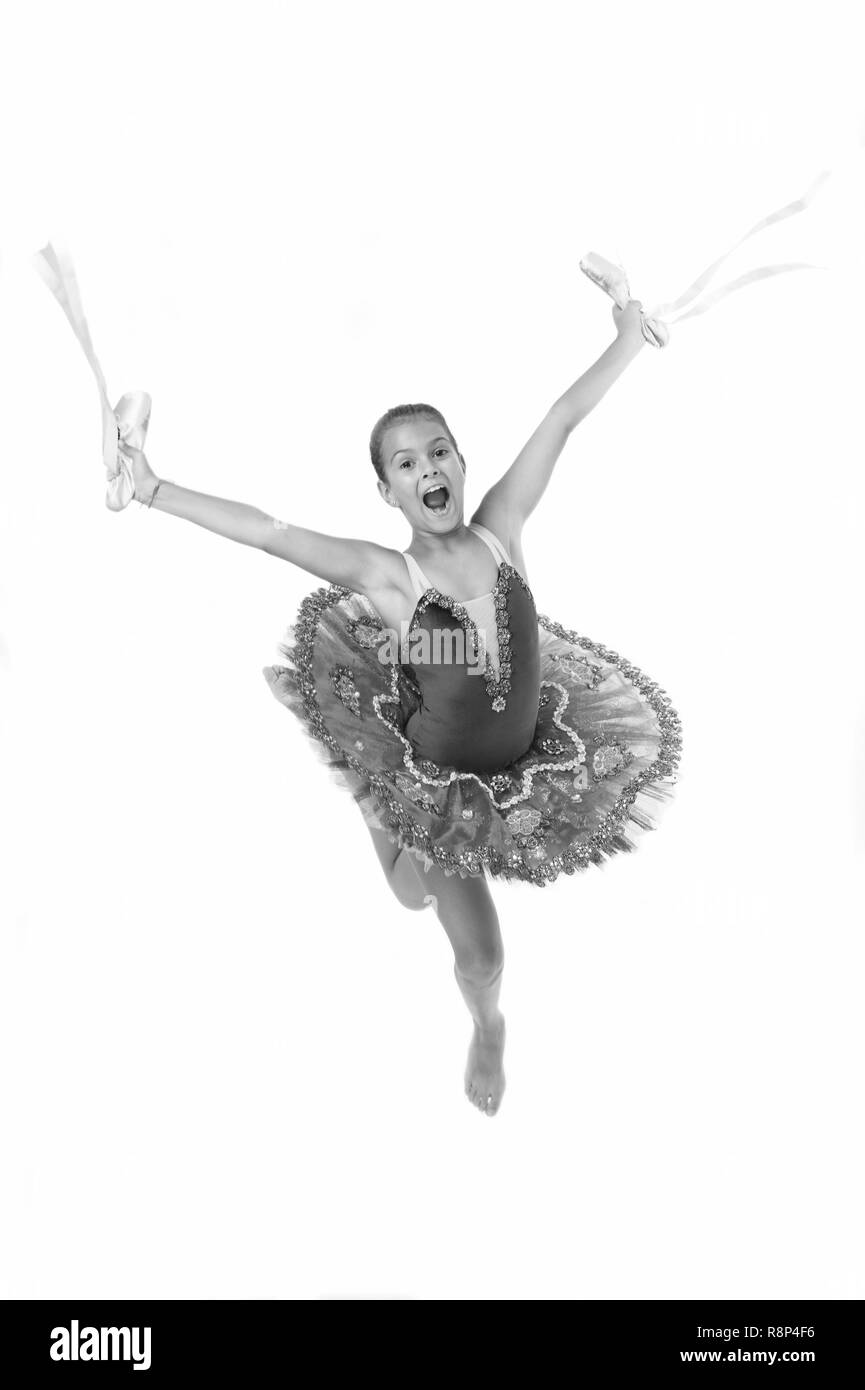 Child happy holds ballet shoes important attribute excellent ballerina.  Girl ballerina holds pointe shoes in hand white background. Classic dance  hobby favorite activity. Born to become famous dancer Stock Photo - Alamy