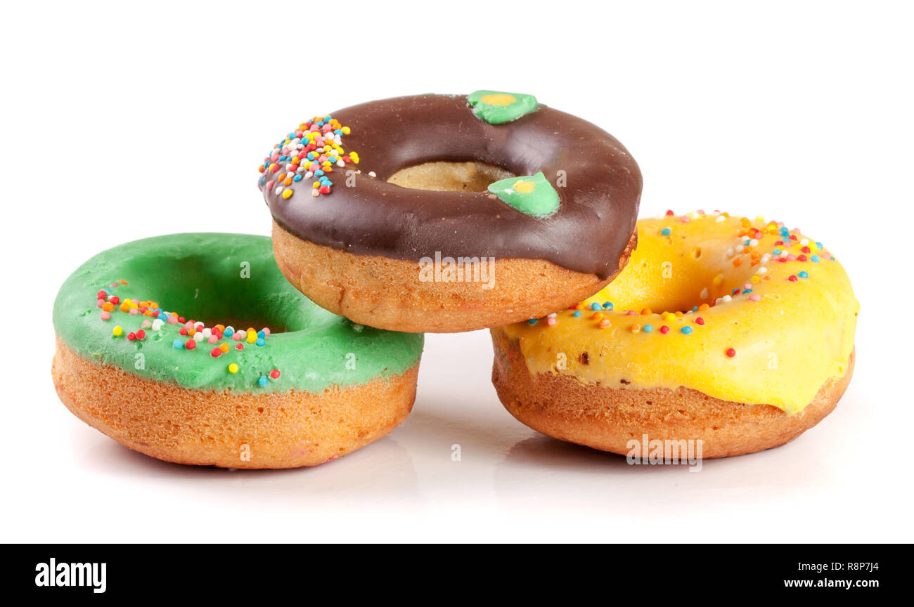 three glazed donuts isolated on white background Stock Photo - Alamy