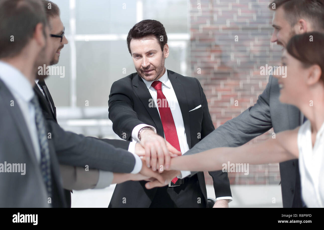 professional business team showing their unity Stock Photo - Alamy