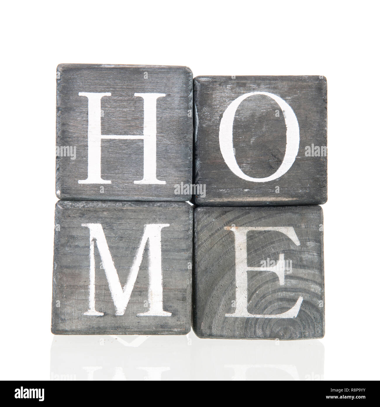 Gray wooden blocks with home text isolated over white background Stock ...