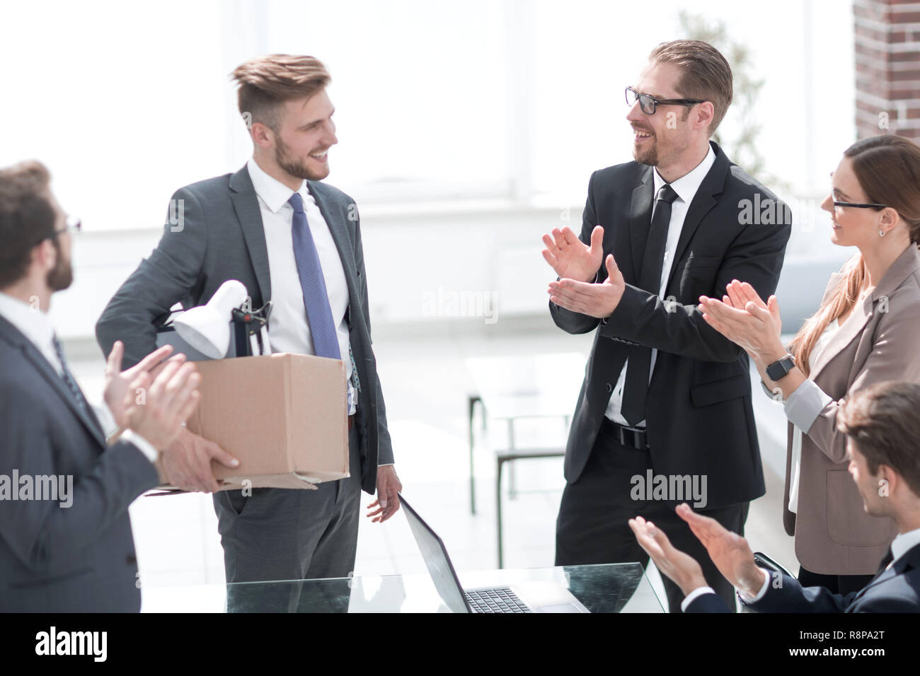 employees welcome the new team member Stock Photo - Alamy