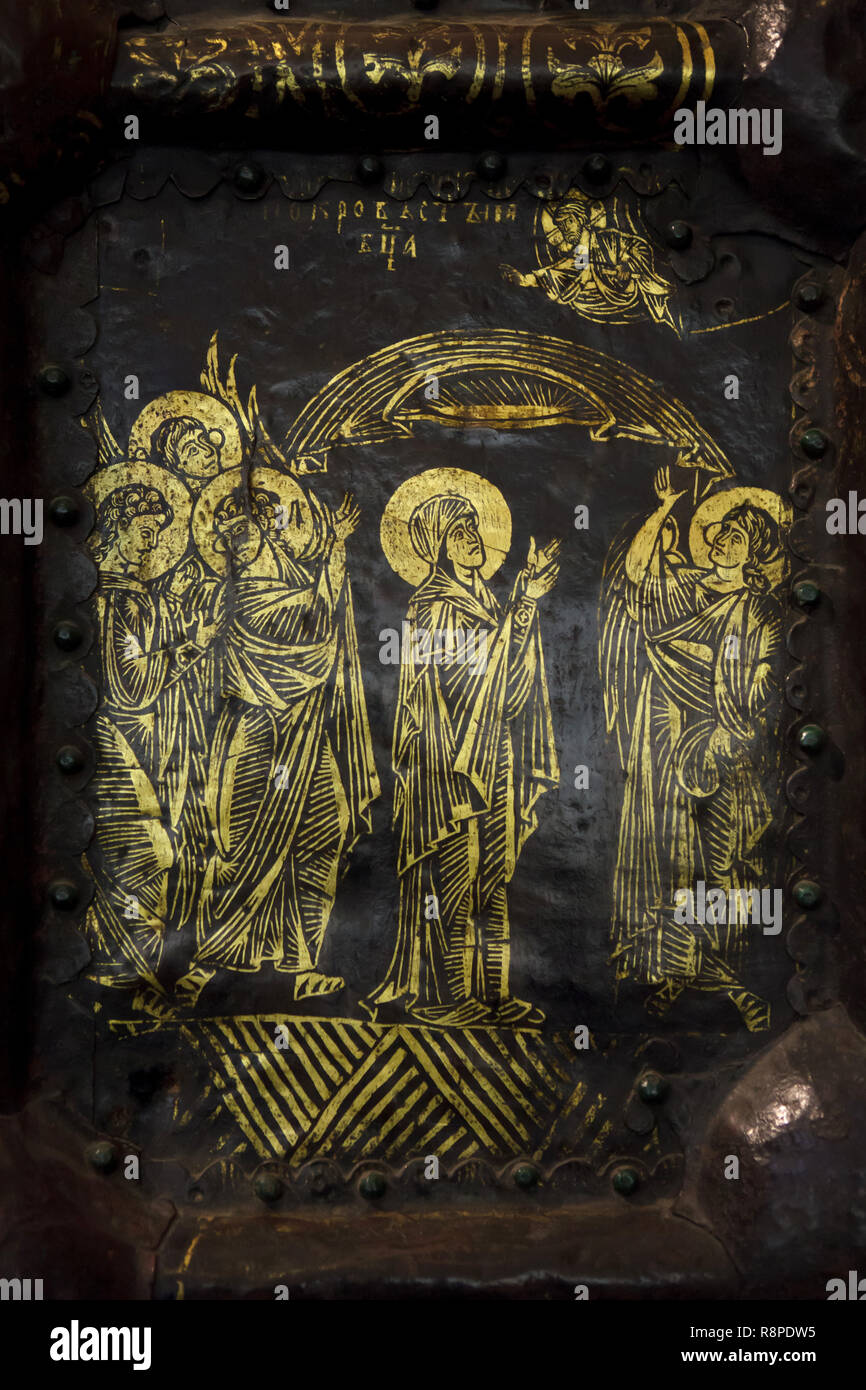 Protection of the Theotokos (Intercession of the Holy Virgin) depicted on the Golden Doors of the Cathedral of the Nativity of the Theotokos (Rozhdestvensky Cathedral) in Suzdal, Russia. The western doors of the Suzdal Cathedral dated from the 13th century are considered to be one of the masterpieces of Russian medieval applied arts. Stock Photo