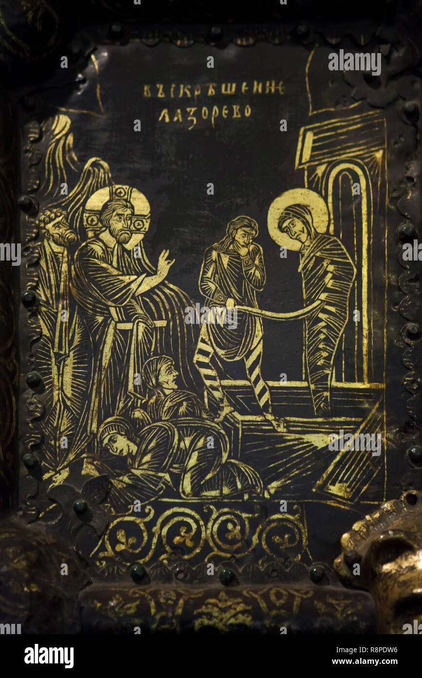 Raising of Lazarus depicted on the Golden Doors of the Cathedral of the Nativity of the Theotokos (Rozhdestvensky Cathedral) in Suzdal, Russia. The western doors of the Suzdal Cathedral dated from the 13th century are considered to be one of the masterpieces of Russian medieval applied arts. Stock Photo