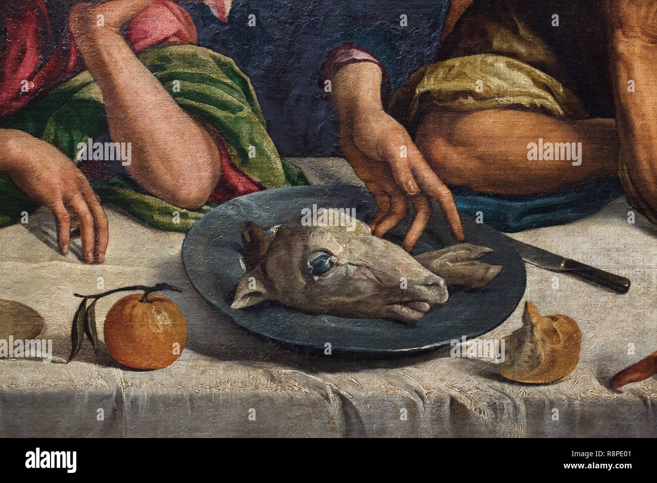 Lamb's head on the plate depicted in the detail of the painting 'Last Supper' by Italian Renaissance painter Jacopo Bassano, also known as Jacopo dal Ponte (1547-1548) on display at the exhibition 'The Young Tintoretto' in the Gallerie dell'Accademia in Venice, Italy. The exhibition marking the 500th anniversary of the birth of Italian Renaissance painter Tintoretto runs till 5 January 2019. Stock Photo