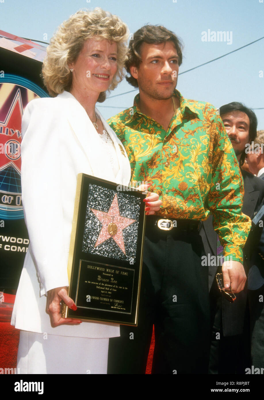 HOLLYWOOD, CA - APRIL 28: Linda Lee Caldwell and actor Jean-Claude Van  Damme attends the Hollywood Walk of Fame Ceremony for Bruce Lee on April  28, 1993 at 6933 Hollywood Boulevard in