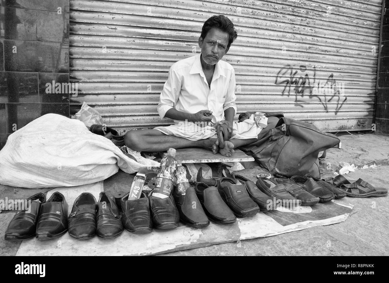 Street cobbler hires stock photography and images Alamy