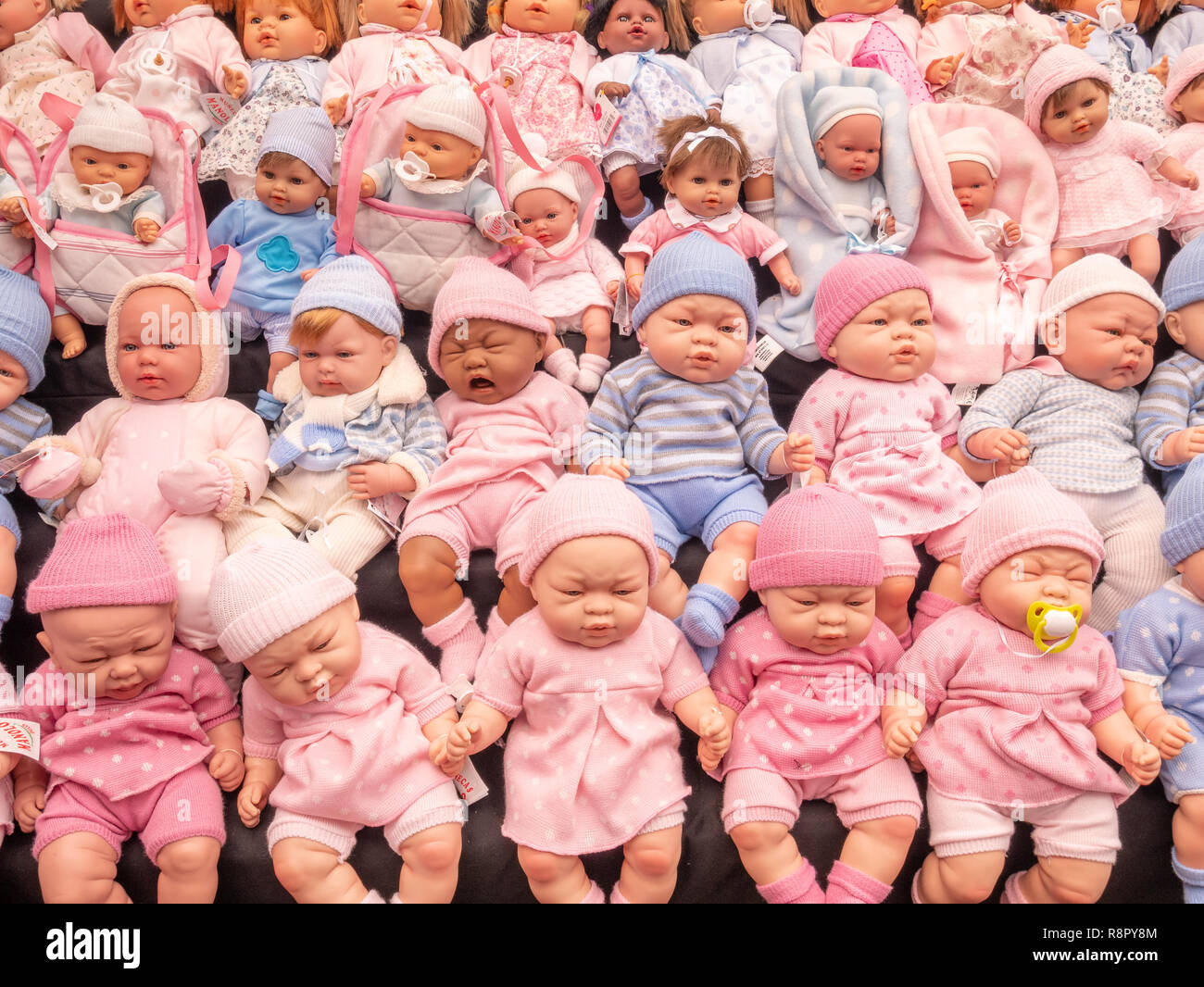 Baby dolls on market stall Stock Photo