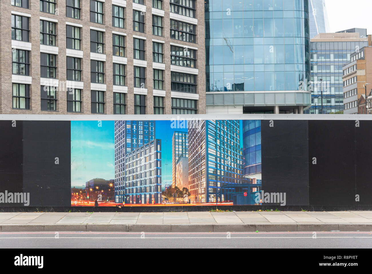 Hoarding showing how new office development will look when completed, Aldgate, City of London, UK Stock Photo