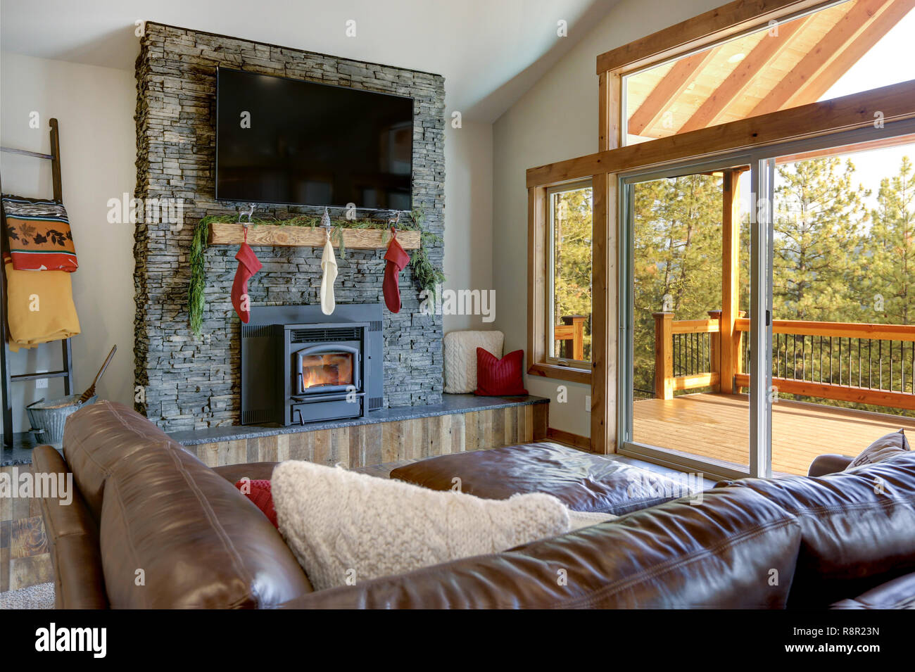 Living Room Interior With Stone Fireplace Christmas Decor And