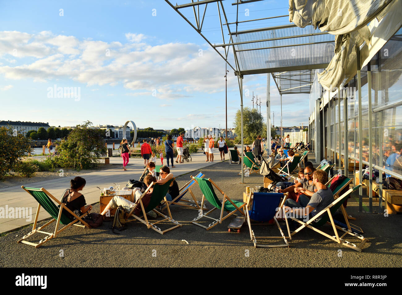 France, Loire Atlantique, Nantes, Ile de Nantes (Island of Nantes), quai des Antilles, the Hangar à Bananes (Bananas Warehouse) and Buren's rings on Loire River quays, La Cantine du Voyage (Travel cafeteria) Stock Photo