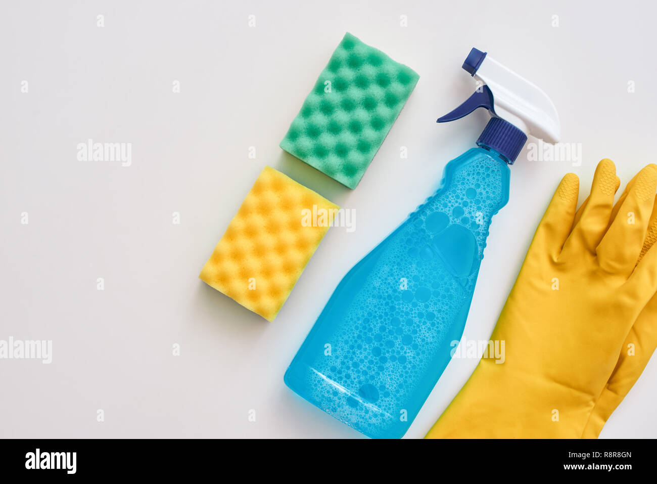 Good housekeeping. Spray bottle and other items isolated Stock Photo