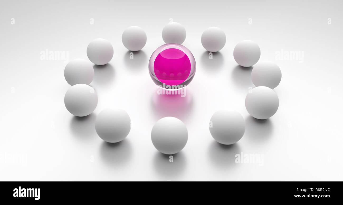Symbol for the leadership by a woman. Pink ball as a symbol of a leader in the center of a group. Stock Photo