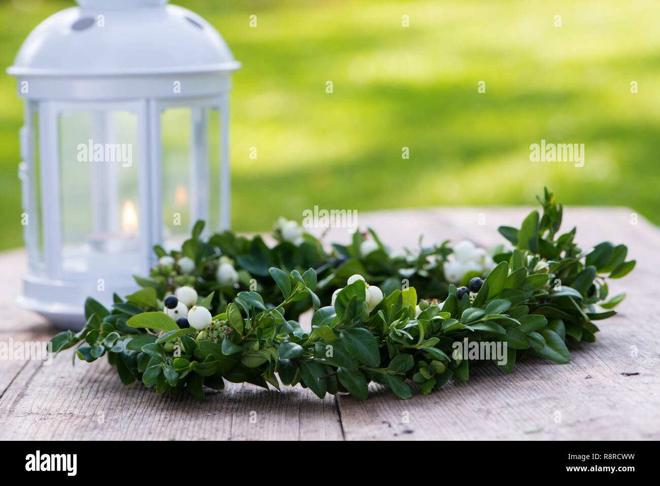 Little wreath on wooden background Stock Photo