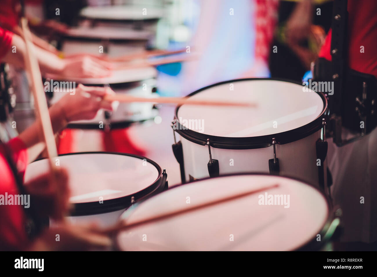 drummer plays with drumsticks on rock drum set Stock Photo Alamy