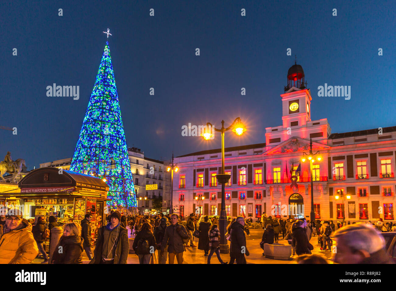 Madrid, Spain Dec 5th 2017 Big group of people walking around a big Walking Around Christmas Tree