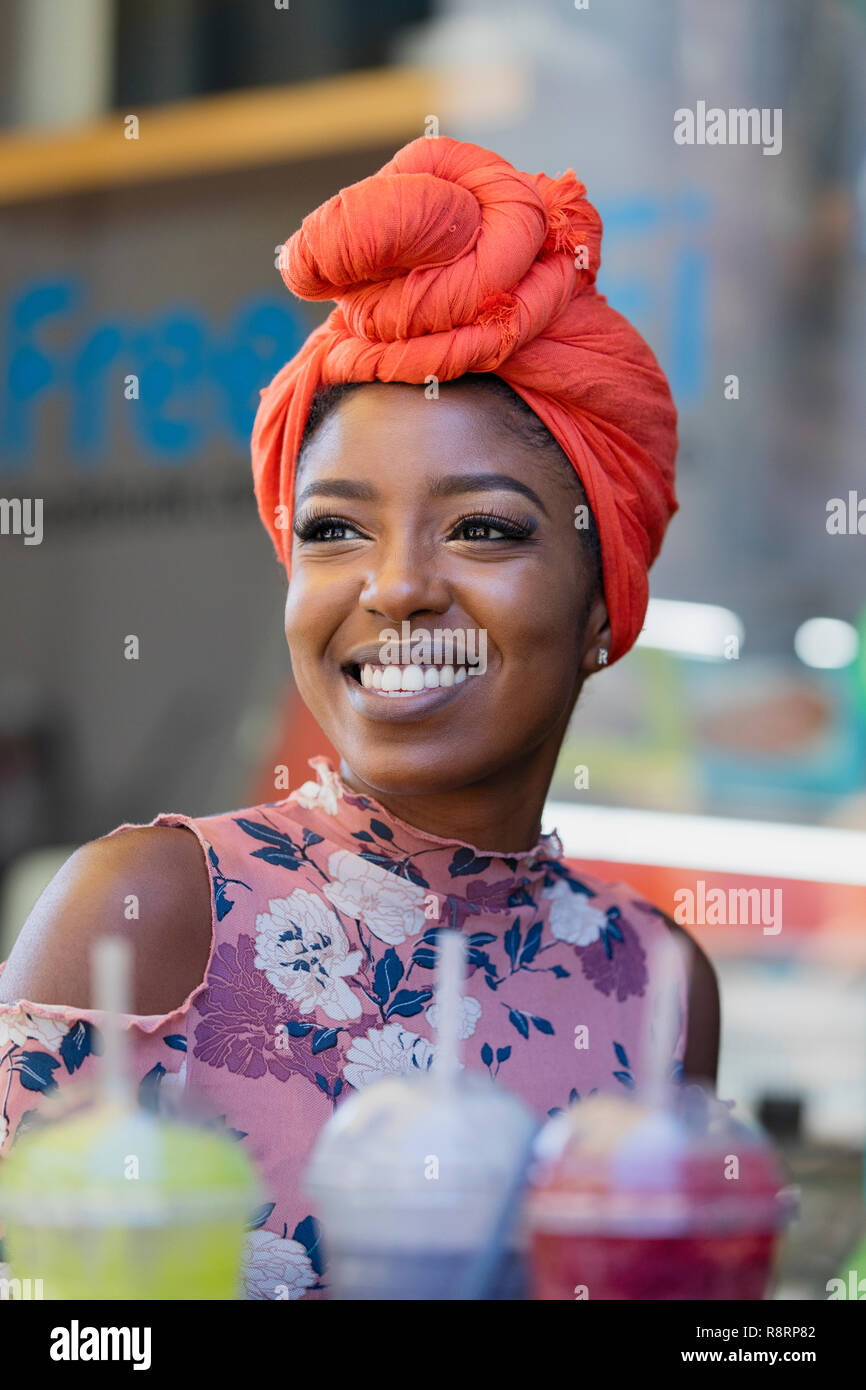 Smiling woman wearing headscarf hi-res stock photography and images - Alamy