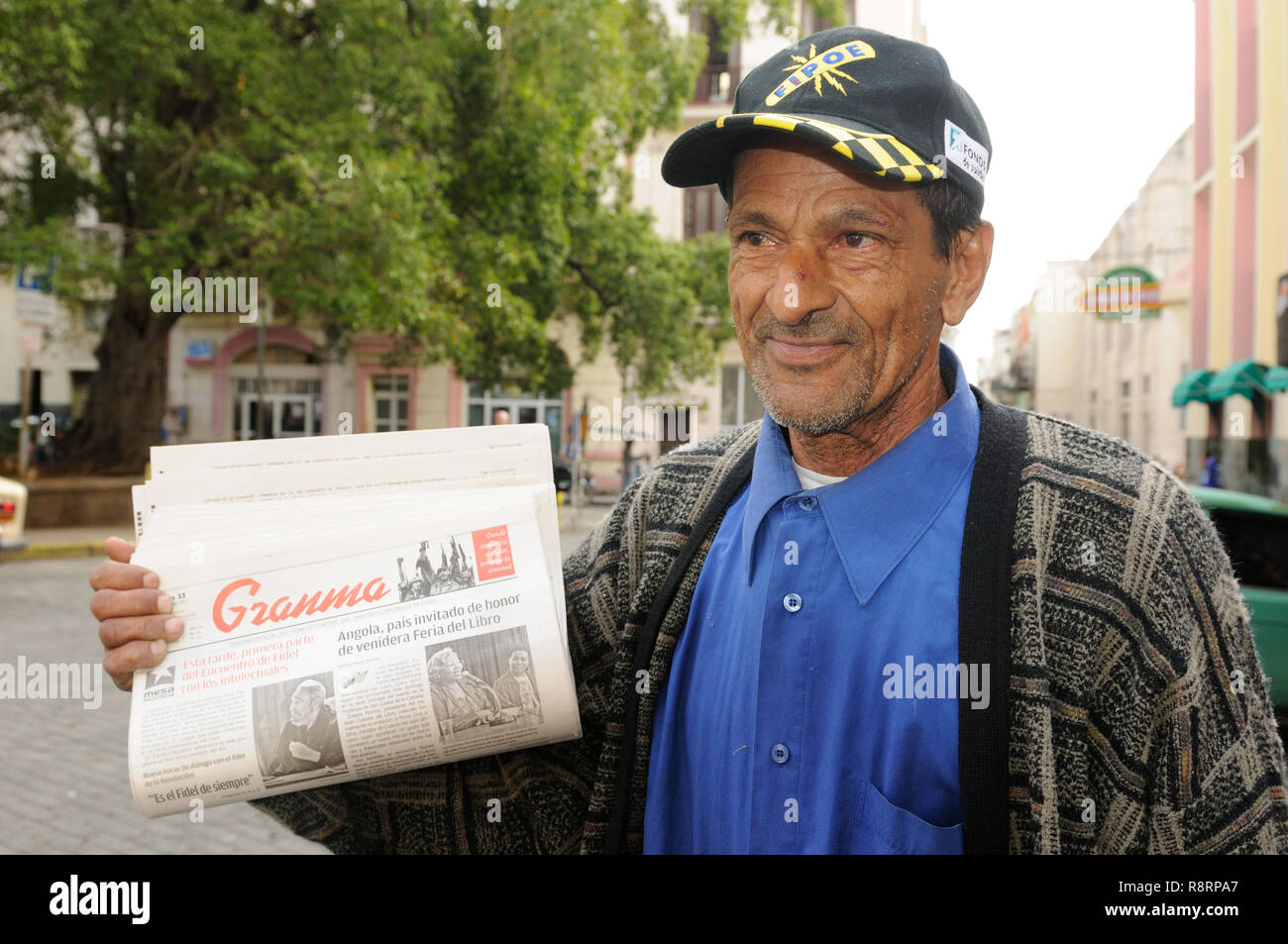 Cuban newspaper street seller in Havanna City: The Grandma is the official government paper. Stock Photo