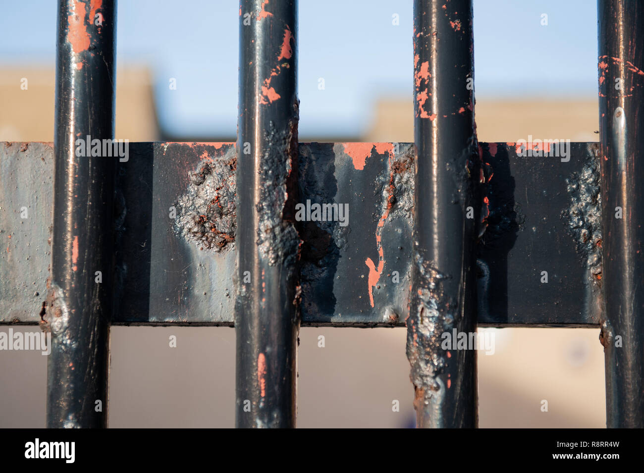 Black, corroded fence bars Stock Photo Alamy
