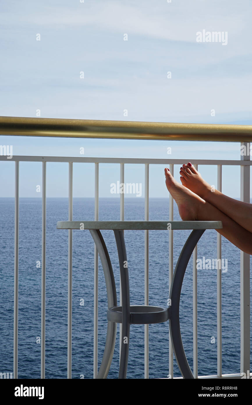 Resting feet on the balcony hi-res stock photography and images - Alamy