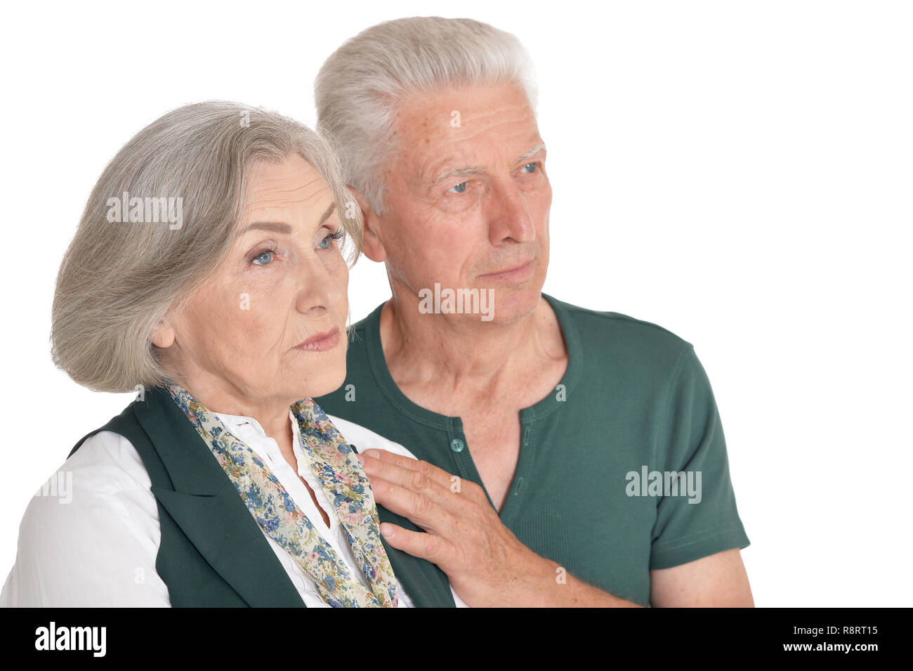 Close up portrait of senior couple isolated on white background Stock Photo