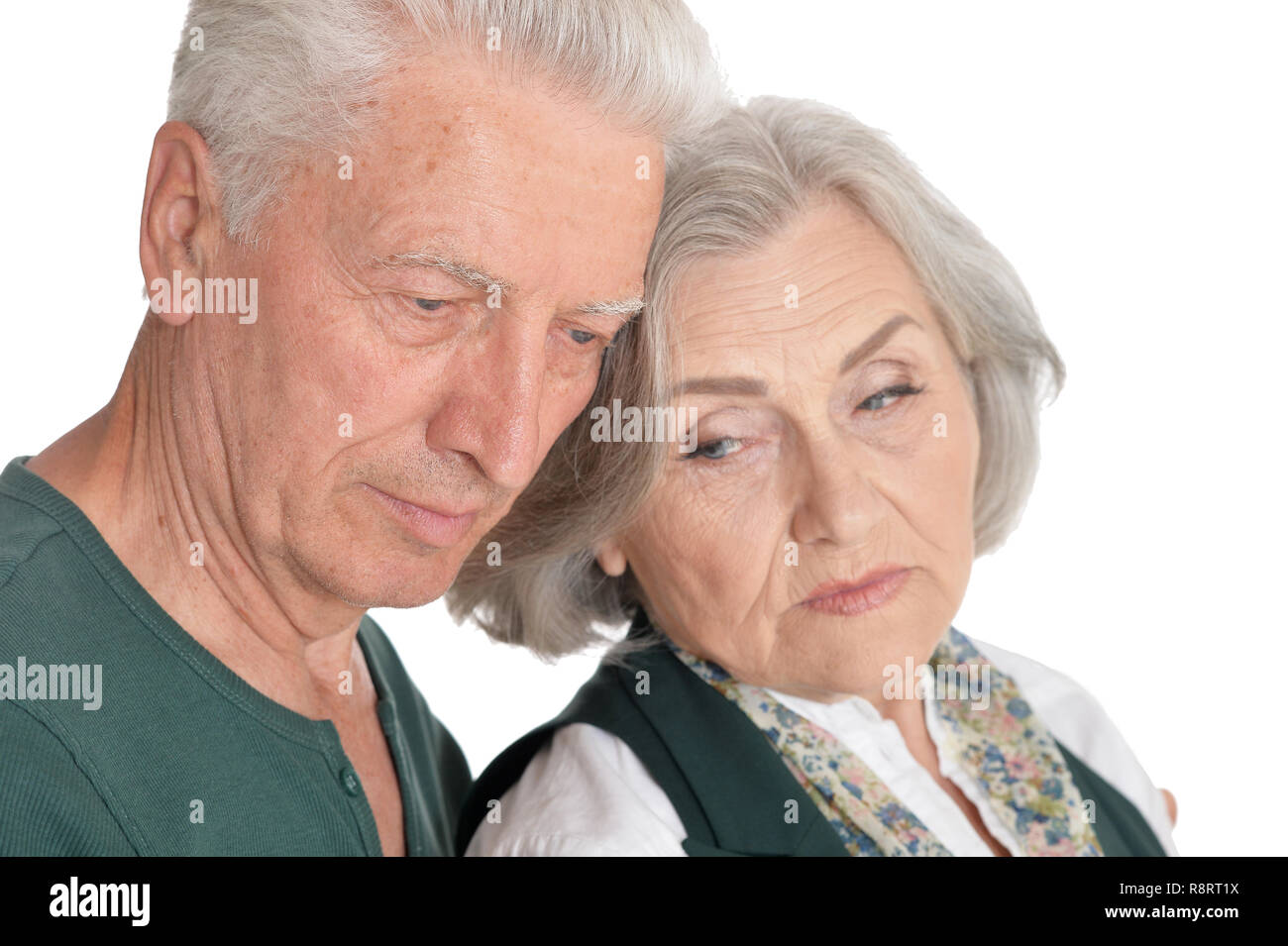 Close up portrait of senior couple isolated on white background Stock Photo