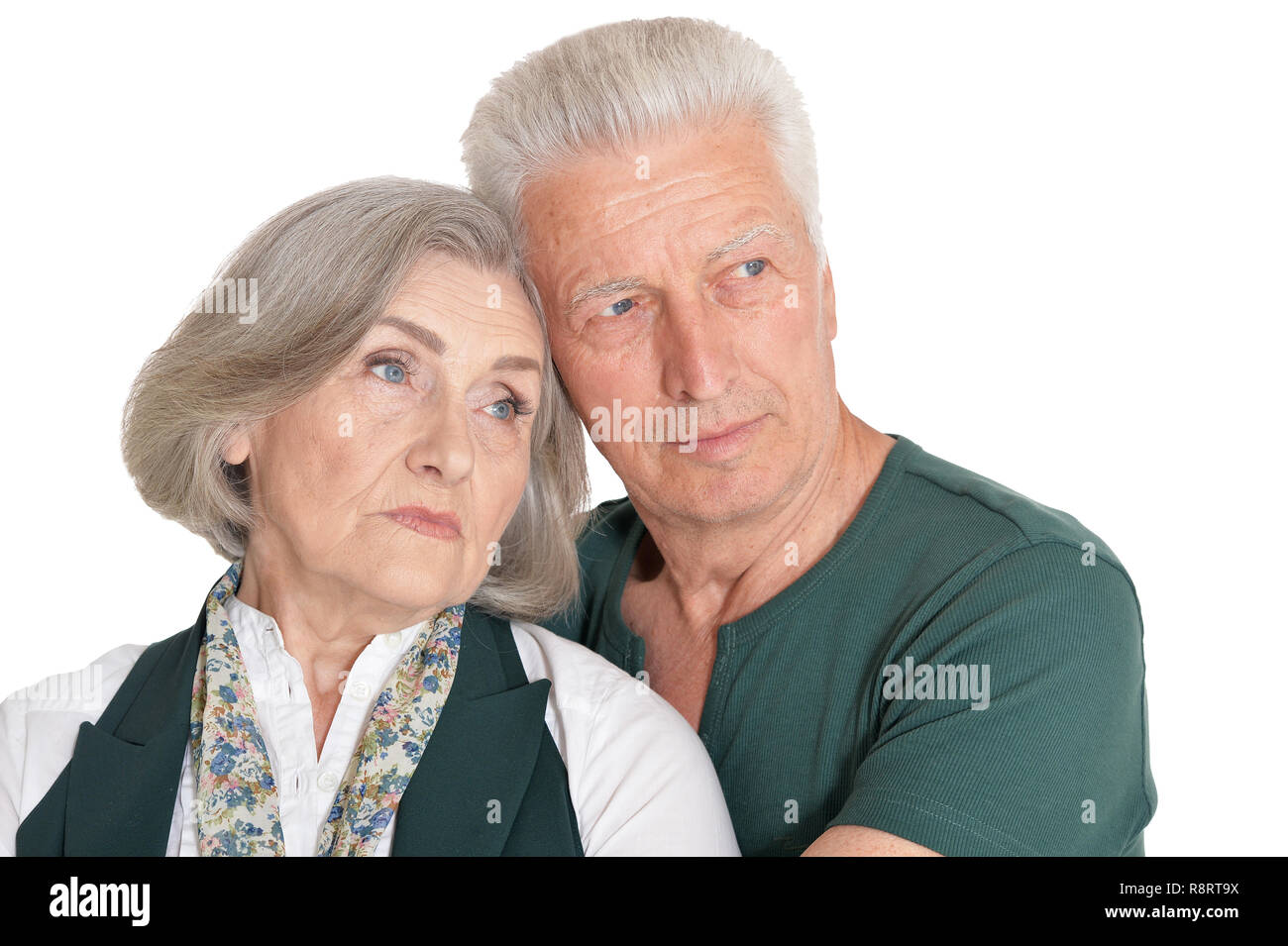 Close up portrait of senior couple isolated on white background Stock Photo