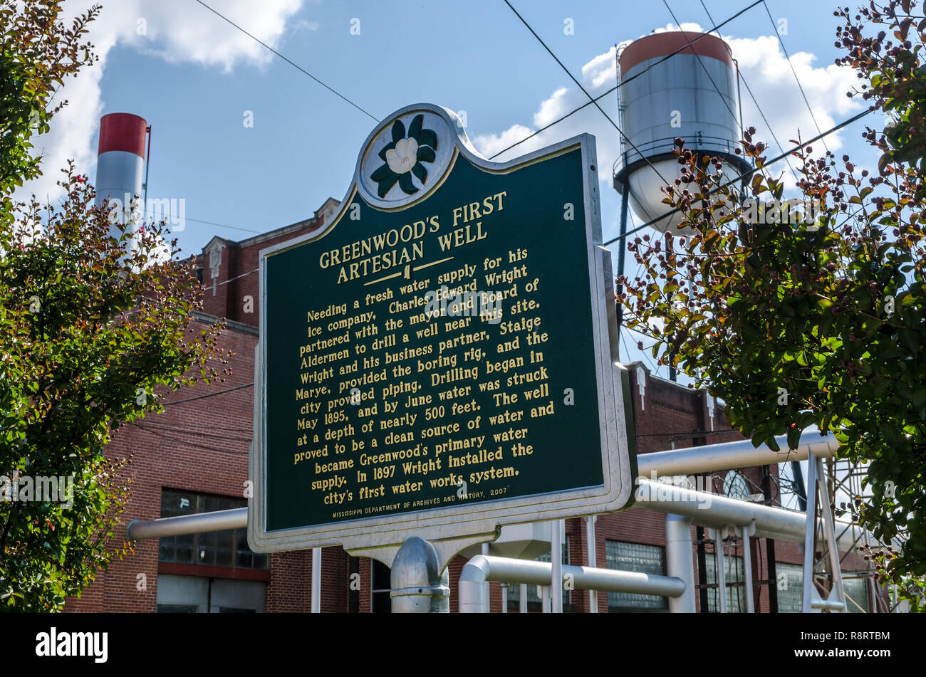 A historic marker commemorates the first artesian well in Greenwood, Mississippi. The city's first water works system was built in 1897. Stock Photo