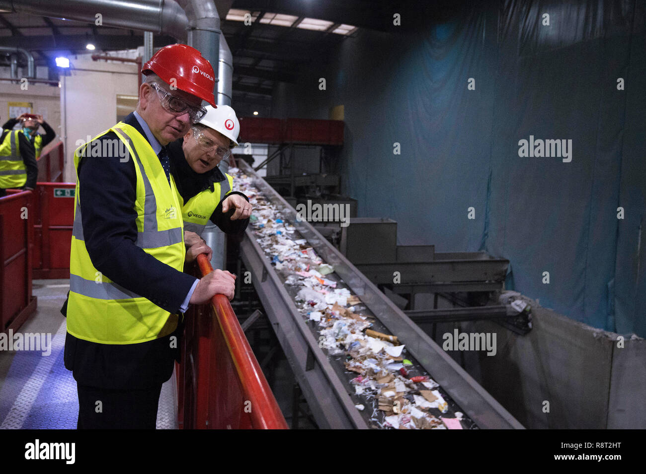 Embargoed to 0001 Tuesday December 18 Environment Secretary Michael Gove (left) visits the Veolia Integrated Waste Management Facility in Southwark, south London, ahead of next week's launch of the government's Resources and Waste Strategy. Stock Photo