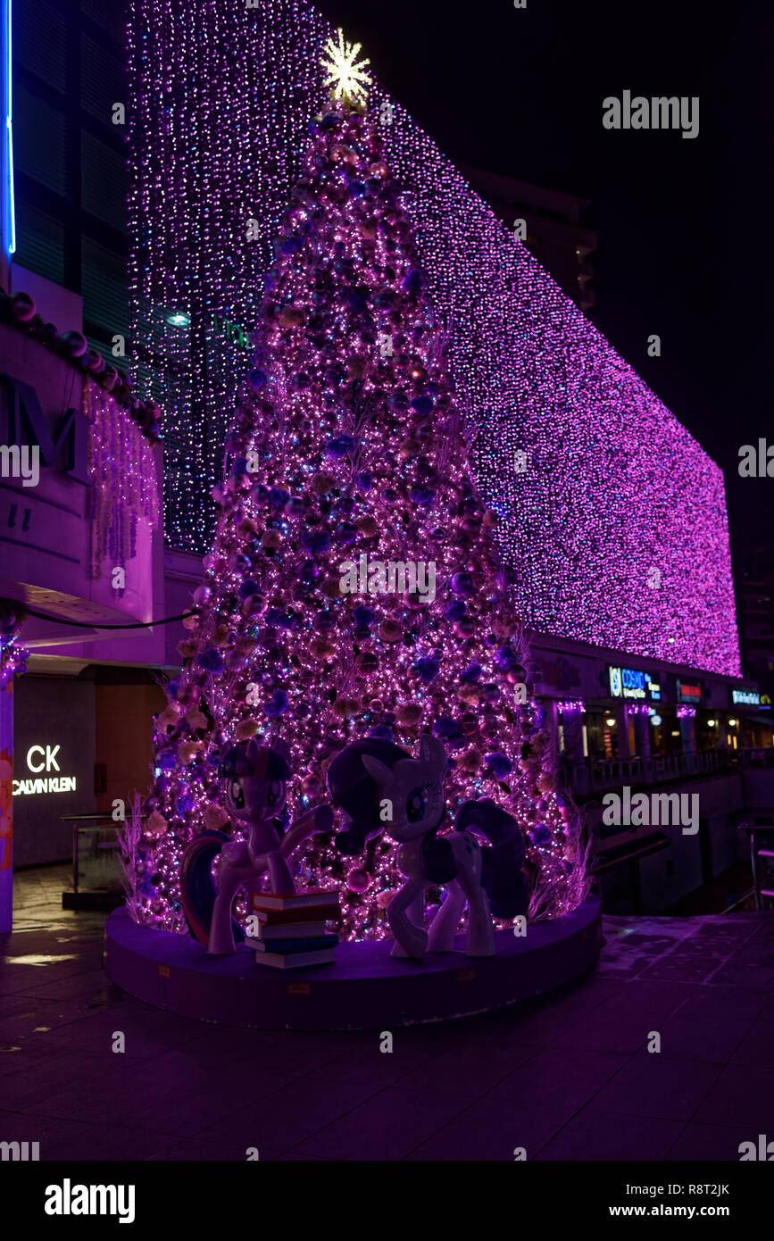 Orchard Road Christmas lights and tree in Singapore, with a Disney theme, pink and cartoon characters Stock Photo