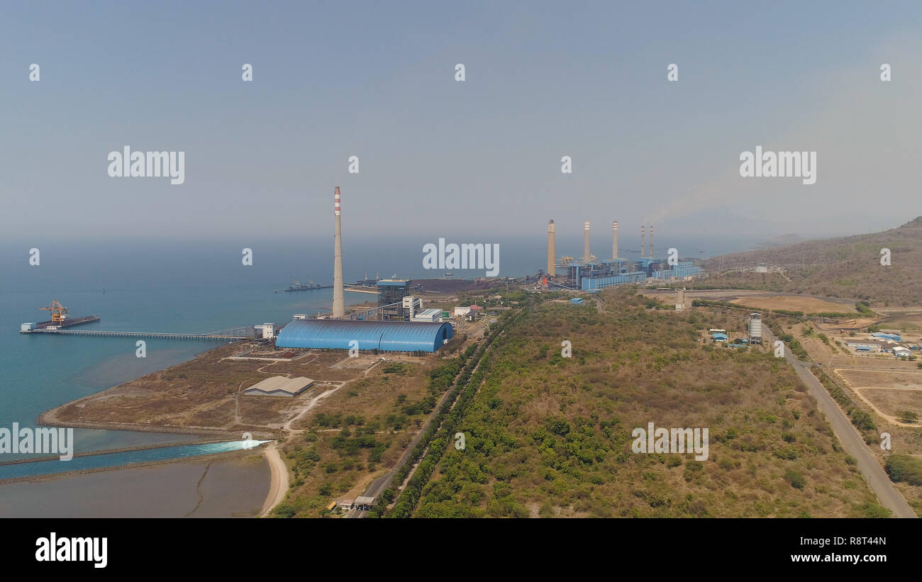 Java Power Plant power station by sea with smoking pipes, paiton java, indonesia. aerial ...