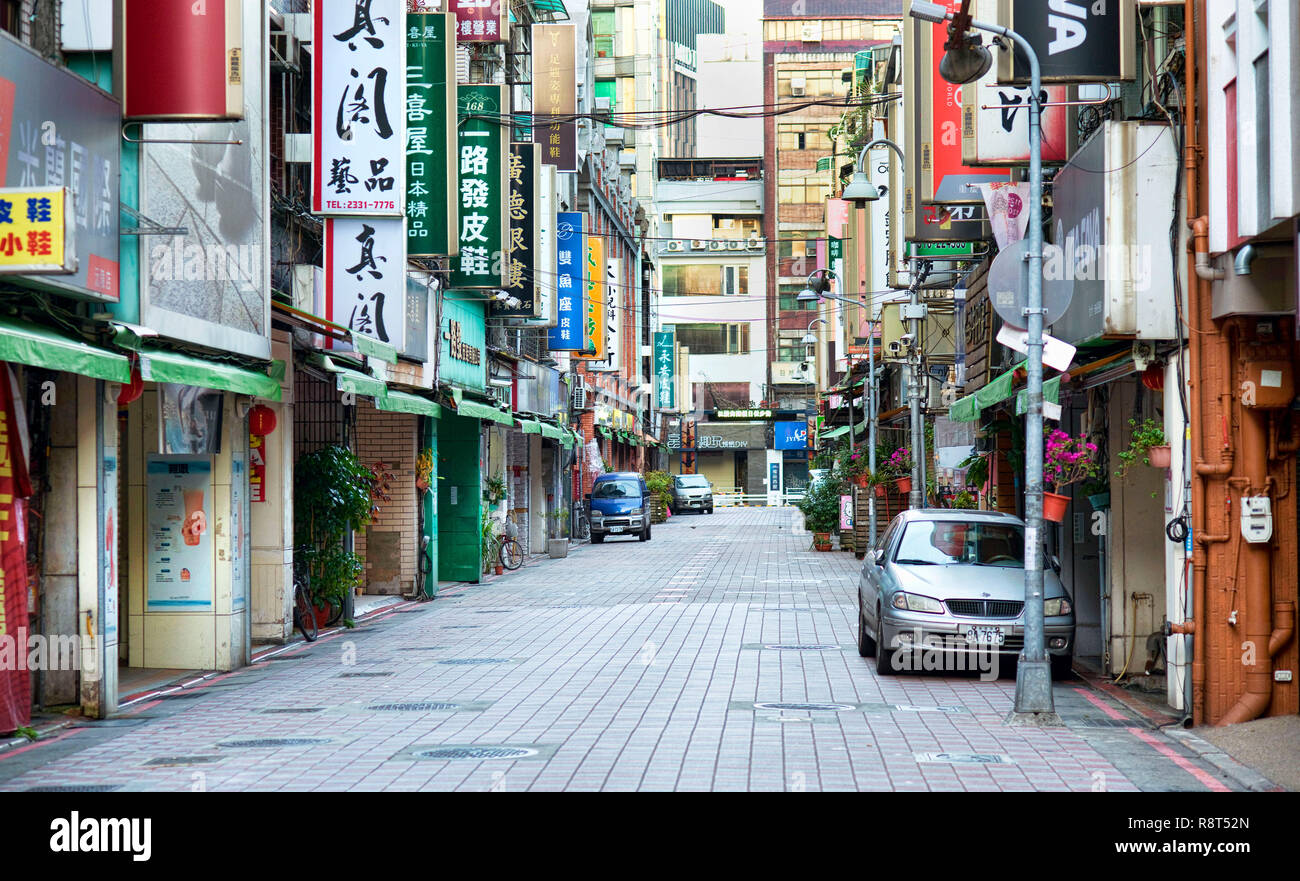 Taipei,Taiwan - Dec.2, 2018 - A typical shoppping side street in Taipei in the early morning before the stores  open. Stock Photo