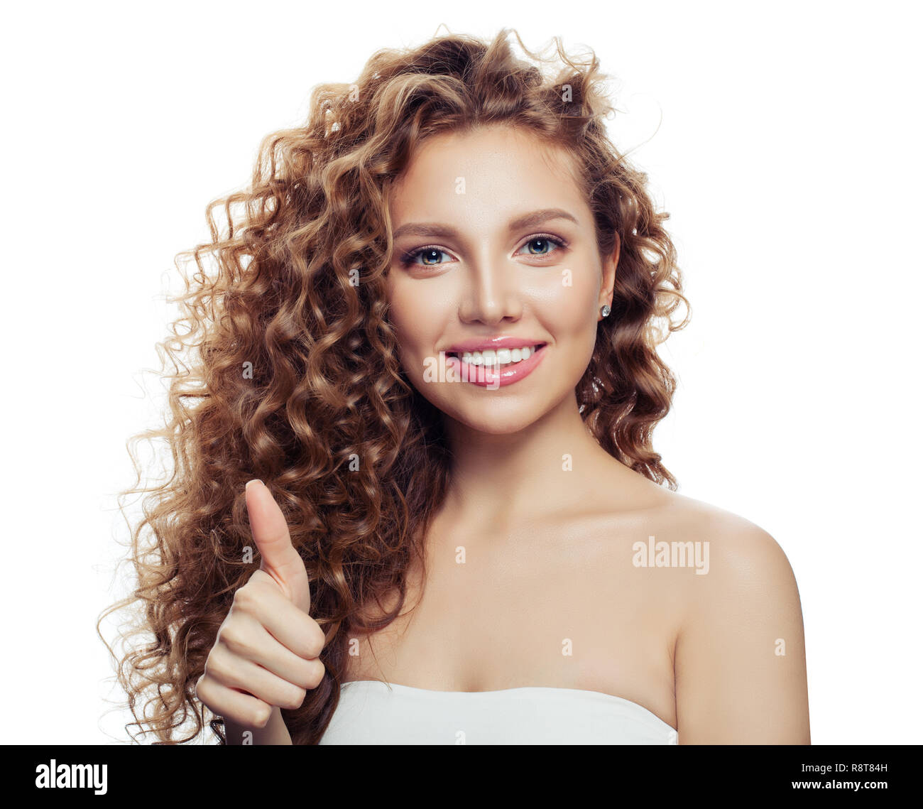 Young smiling woman thumb up isolated on white. Happy girl Stock Photo ...