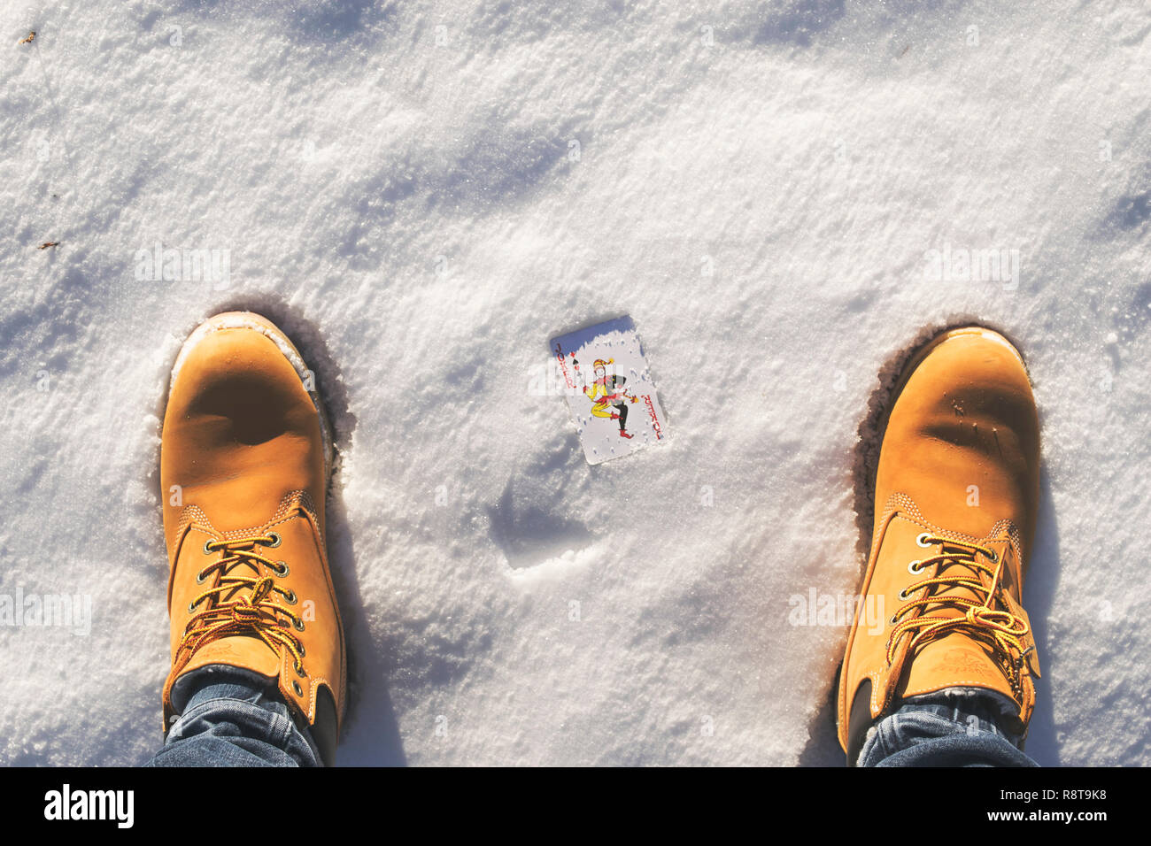 Joker Card in the Snow Stock Photo